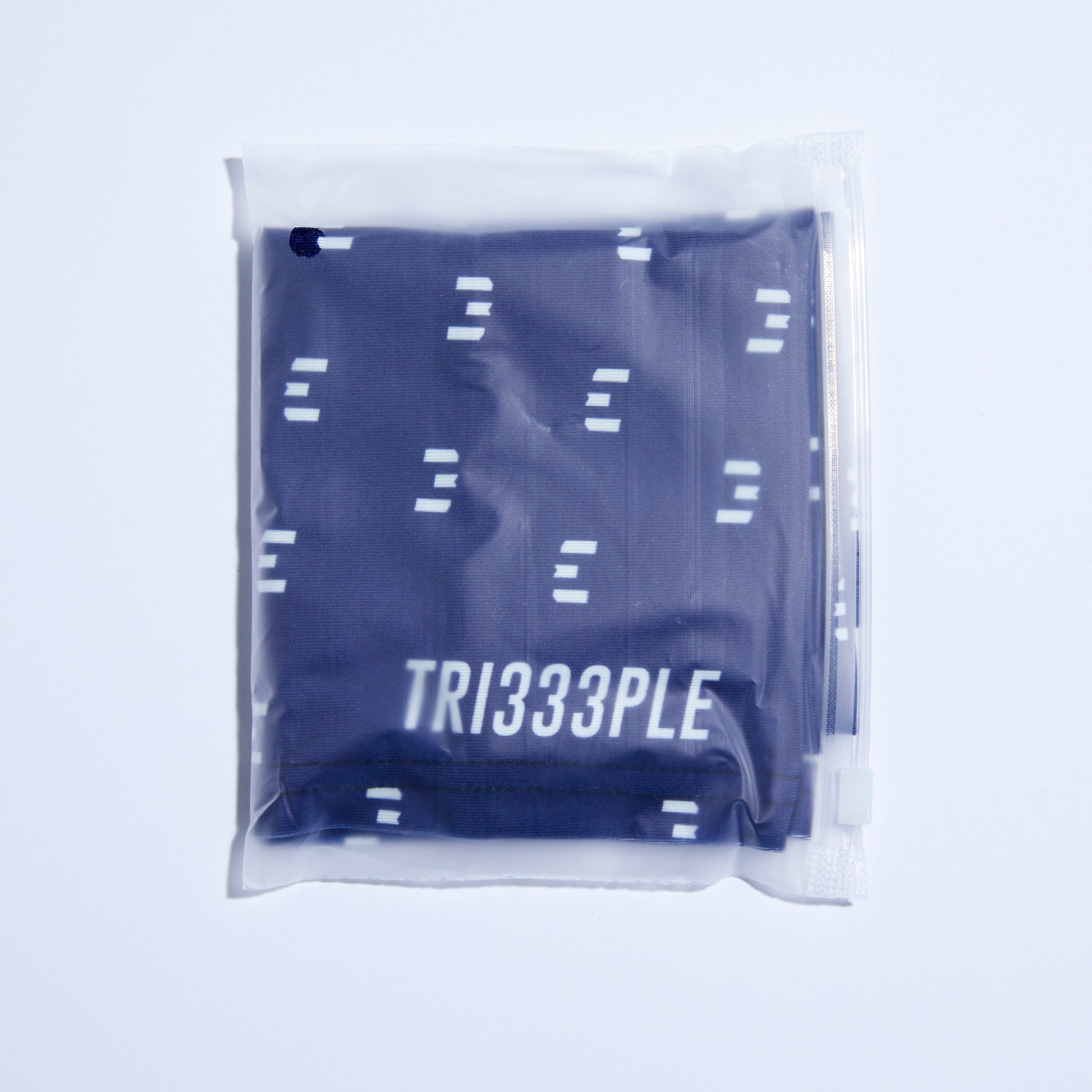 tri333ple lycra headbuff for motorcycle midnight blu in packaging